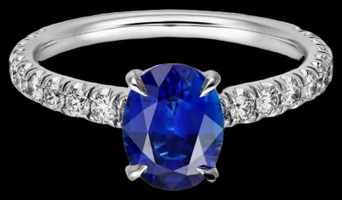 Cartier 1895 solitaire, oval-cut sapphire, paved