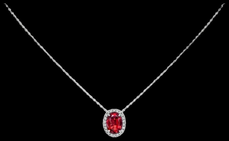 Cartier Destinée pendant, oval-cut ruby, paved