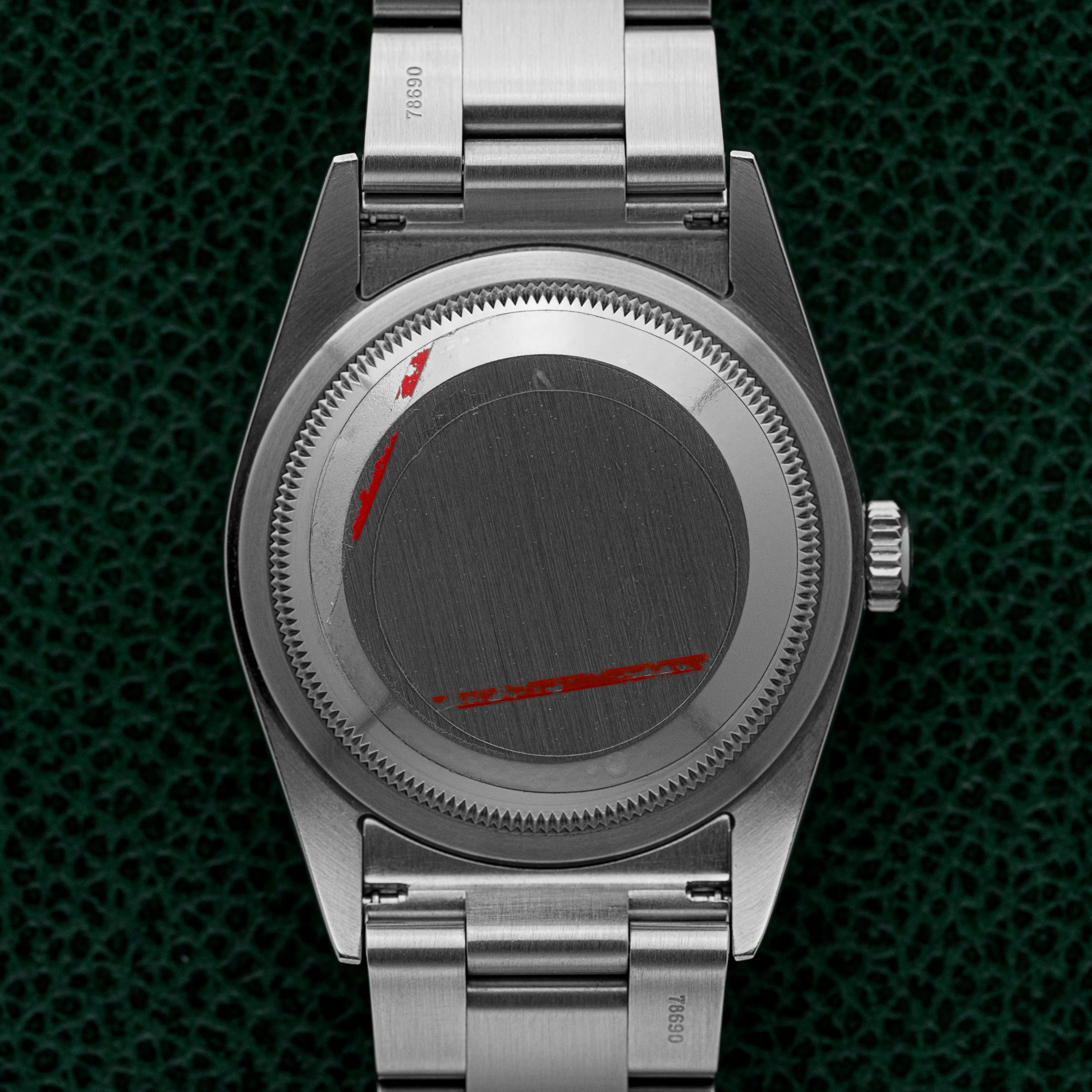 Rolex Explorer 114270 polished stainless steel caseback close-up